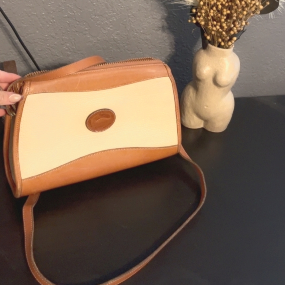 Selling this vintage handbag from dooney and burke.